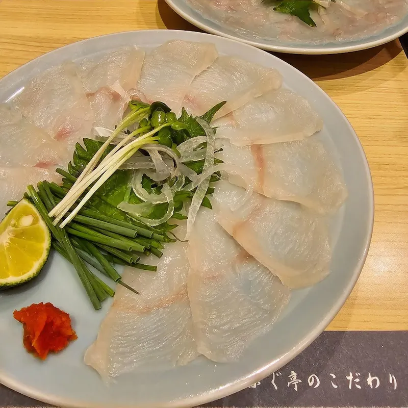 Shabu Shabu Fugu Restaurant (unnamed in transcript, referred to as 'SH' and 'questa di pesce palla') foto 5